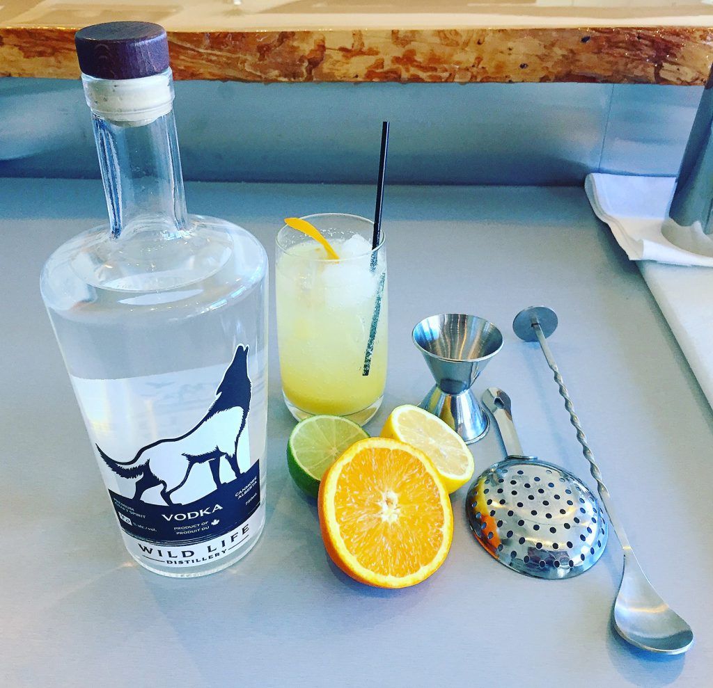 Mixing cocktails with Wild Life Vodka distilled in Alberta